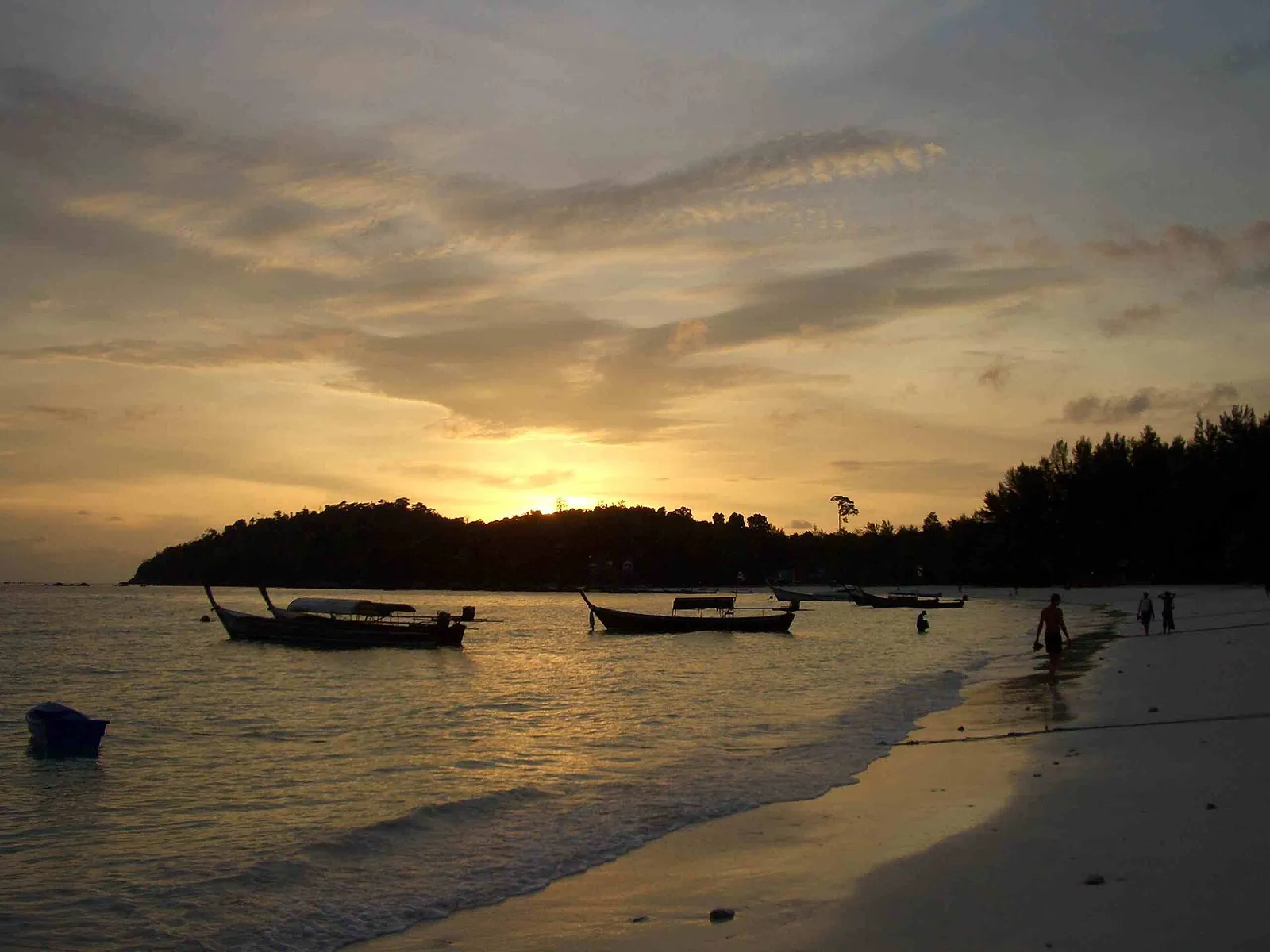 Longtail boats at Pattaya Beach, Koh Lipe, at dawn